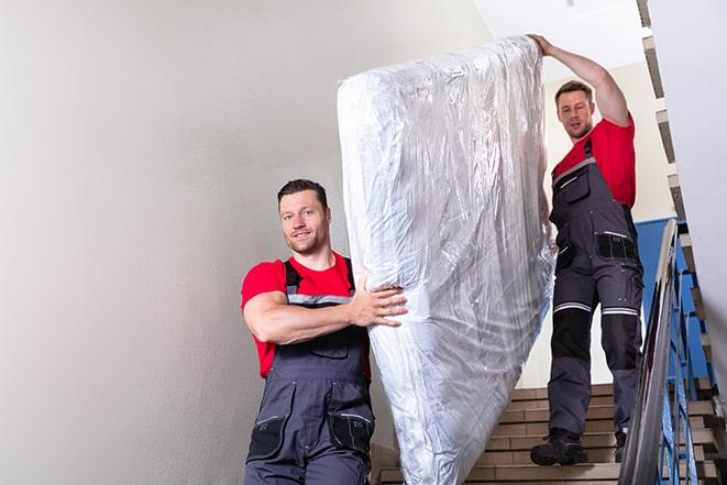 careful handling of a box spring during removal in Lake Clarke Shores